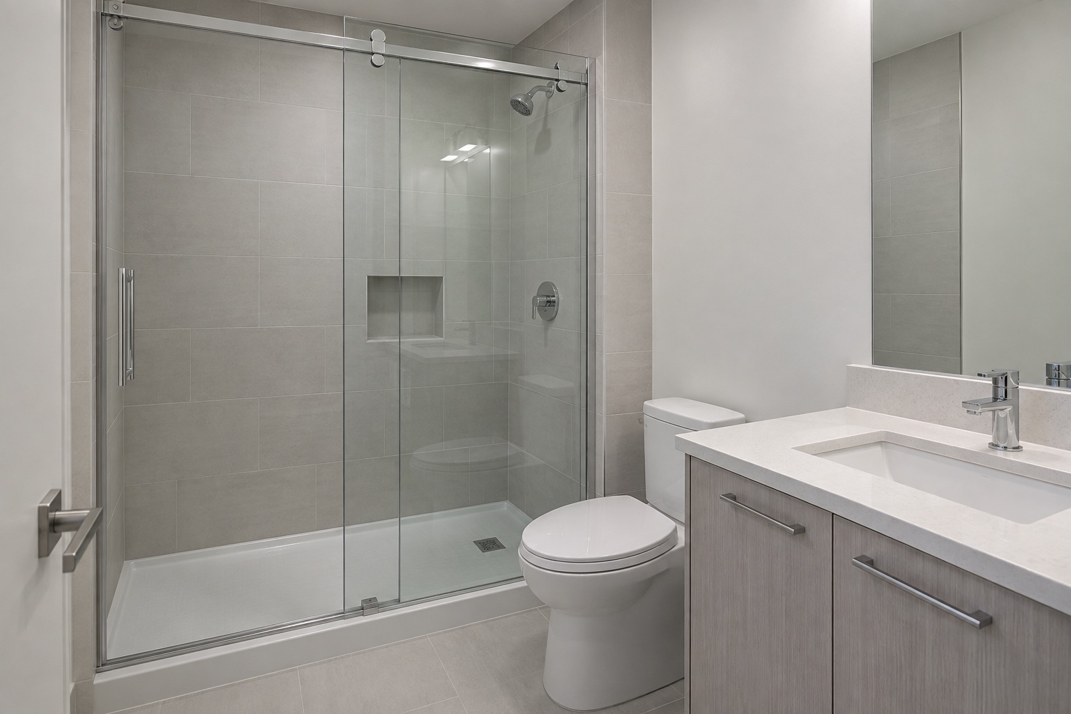 Newly installed sliding glass shower doors